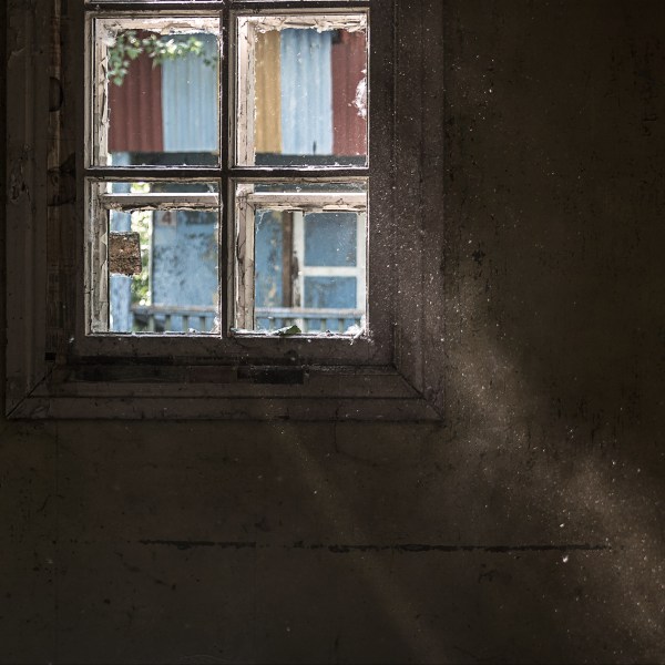 Rays of sun through an old window