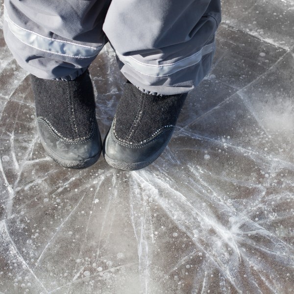 Image of someone standing on thin ice cracking