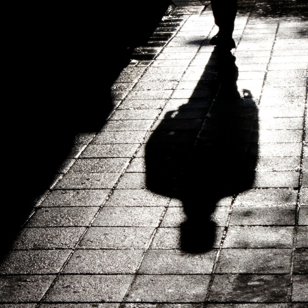 Blurry shadow and silhouette of a man